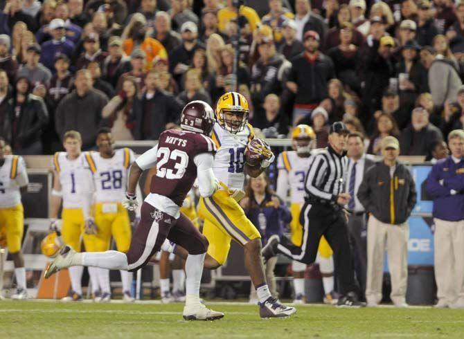 LSU sophomore quaterback Anthony Jennings (10) rushes the ball during the Tigers' 23-17 victory over Texas A&amp;M on Thursday, Nov.27, 2014 in Kyle field.