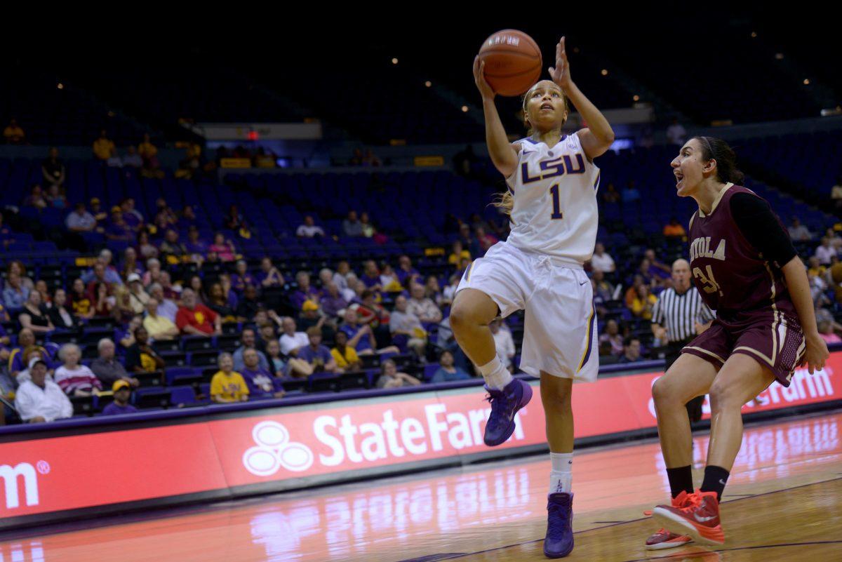 LSU freshman guard, Jenna Demmer (1), shoots the ball in the PMAC where LSU defeated Loyola 93-71 on November 5, 2014.