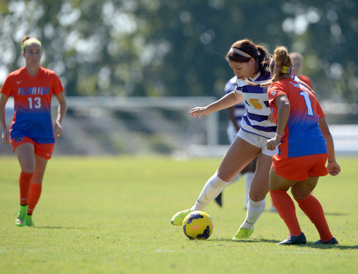 LSU freshman forward, Jorian Baucom (5), dribbles the ball during Tigers' 3-0 defeat against Florida Sunday, October 26, 2014 in LSU Soccer Stadium.