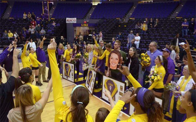 LSU volleyball team chant LSU alma mater surrounding their senior players after the Tigers' 3-1 victory over Missouri Friday, Nov. 21, 2014 on the PMAC.