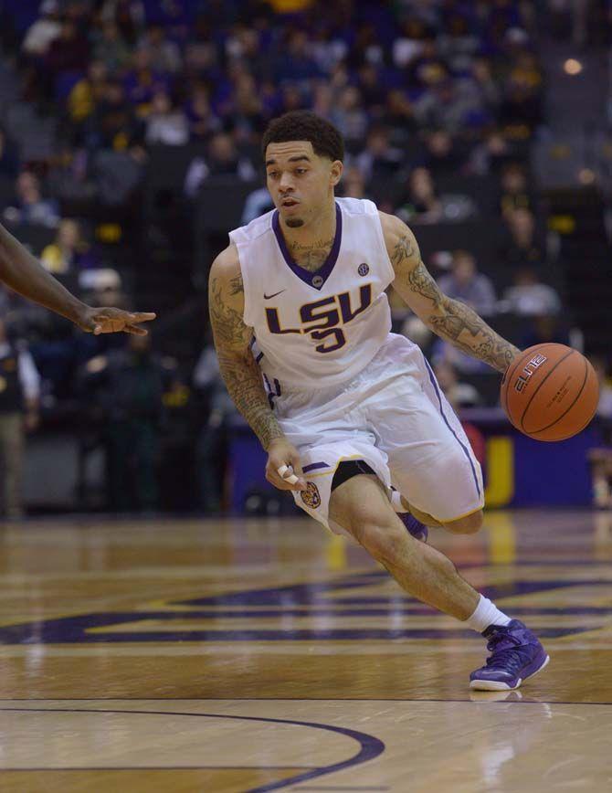 LSU junior guard Josh Gray (5) dribbles the ball during the Tigers' 69-64 OT victory against Texas Tech Tuesday, Nov. 18, 2014 in the PMAC.