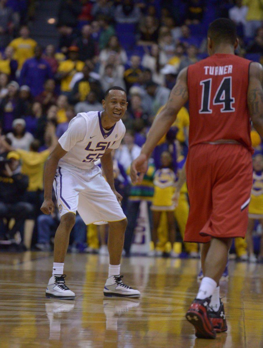 LSU sophomore guard Tim Quarterman (55) plays defense during the Tigers' 69-64 victory against Texas Tech Tuesday, Nov. 18, 2014 in the PMAC