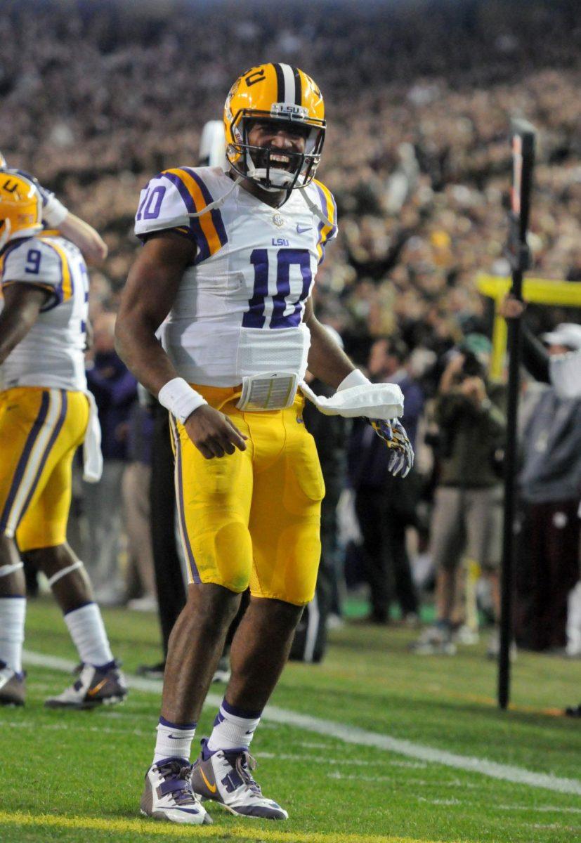 LSU sophomore quarterback, Anthony Jennings (10), celebrates after throwing a touchdown to freshman wide receiver, John Diarsem(9) during the Tiger&#8217;s 23-17 victory over Texas A&amp;M in Kyle Field, College Station on November 27, 2014.