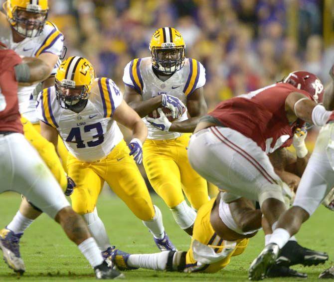 LSU freshman running back Leonard Fournette (7) makes his way downfield Saturday, Nov. 8, 2014 during the Tigers' 20-13 loss against the Crimson Tide in Tiger Stadium.