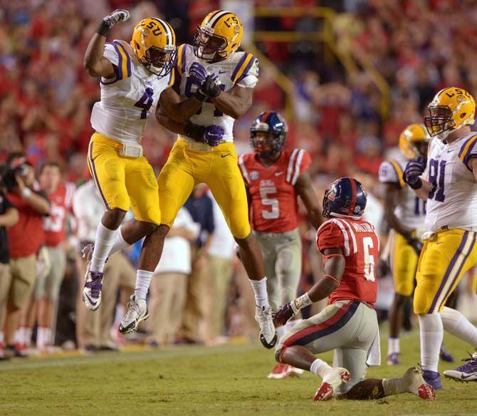 LSU junior linebacker Kwon Alexander (4) celebrates with junior defensive end Danielle Hunter (94) during the Tigers' victory 10-7 over Ole Miss Saturday, October 25, 2014 in LSU Tiger Stadium.