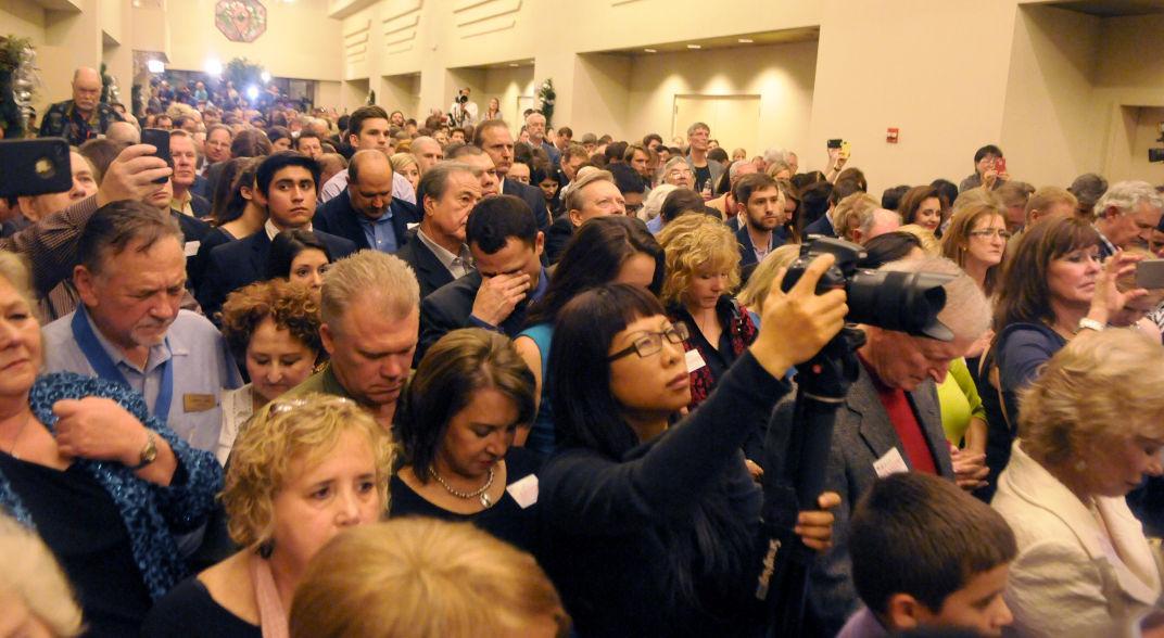 Cassidy supporters crowd the Crowne Plaza Hotel atrium Saturday December 6, 2014.