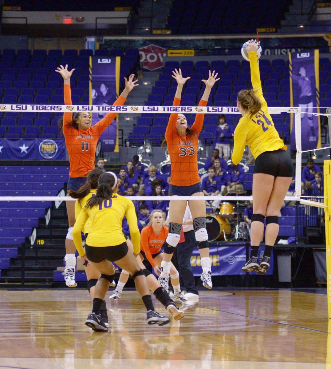 LSU junior Cati Leak spikes the ball against Auburn at the 3-0 Win LSU vs Auburn at the PMAC November 23, 2014.