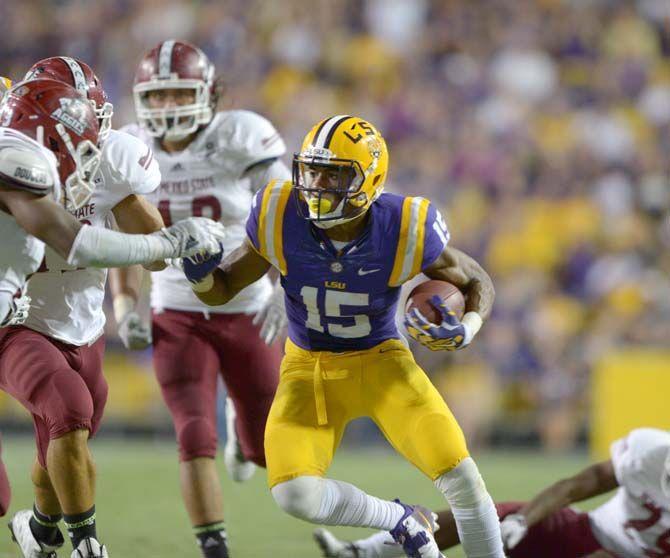 LSU freshman wide receiver Malachi Dupre (15) runs the ball down the field in Tiger Stadium Saturday, September 27, 2014. Tigers win 63-7 against NMSU Aggies.