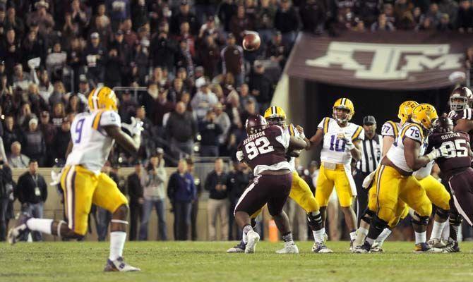 LSU sophomore quaterback Anthony Jennings (10) trhows a pass to freshman wide receiver Jhon Diarse (9) during the Tigers' 23-17 victory on Thursday, Nov.27, 2014 in Kyle field.