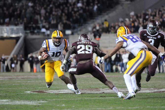 LSU sophomore quarterback, Anthony Jennings (10), runs the ball down Kyle Field in College Station on November 27, where the Tigers won 23-17 against Texas A&amp;M.