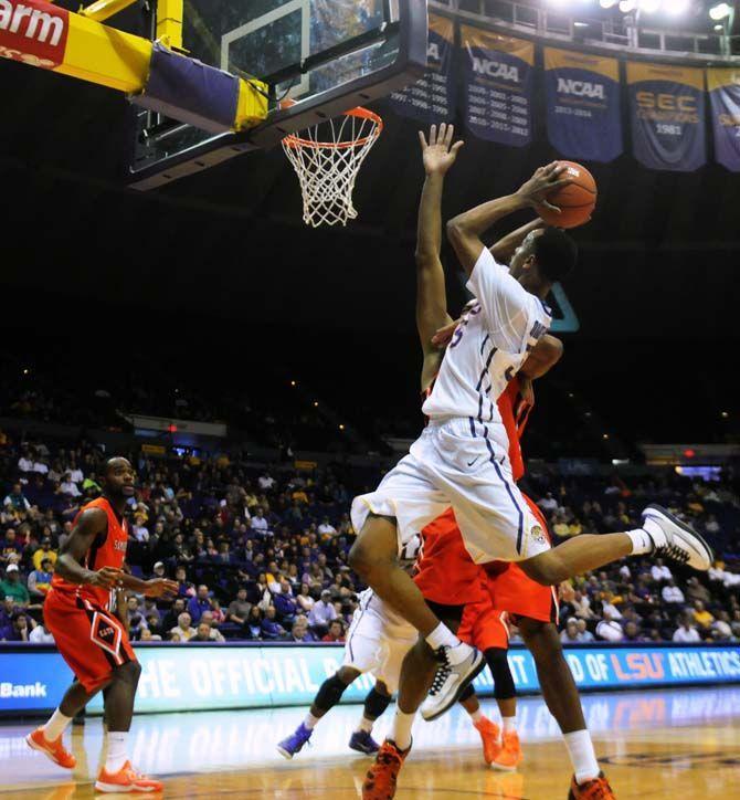 LSU sophomore guard Tim Quarterman (55) attempts to score Sunday, Dec. 13, 2014 during the Tigers' match-up against Sam Houston State in the PMAC.