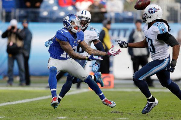 Odell Beckham Jr. had 11 receptions and threw a 60-yard pass against the Titans on Sunday.&#160;(James Kenney/Associated Press)