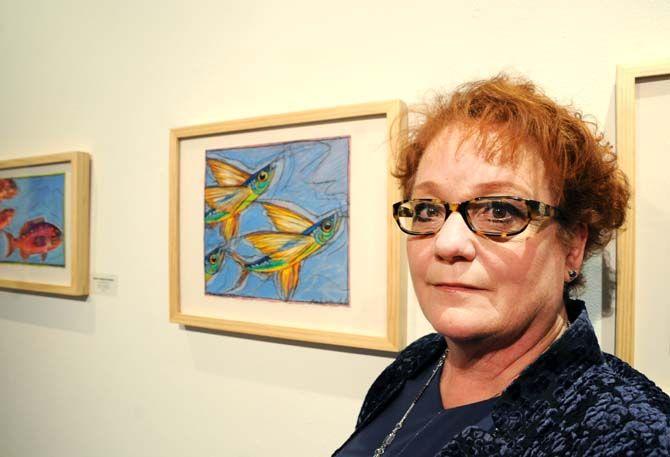 LSU professor and director of agriculture communications and public relations, Frankie Gould, presents her exhibit, "Fish Tales and Other Schools of Thought," at the Baton Rouge Gallery.