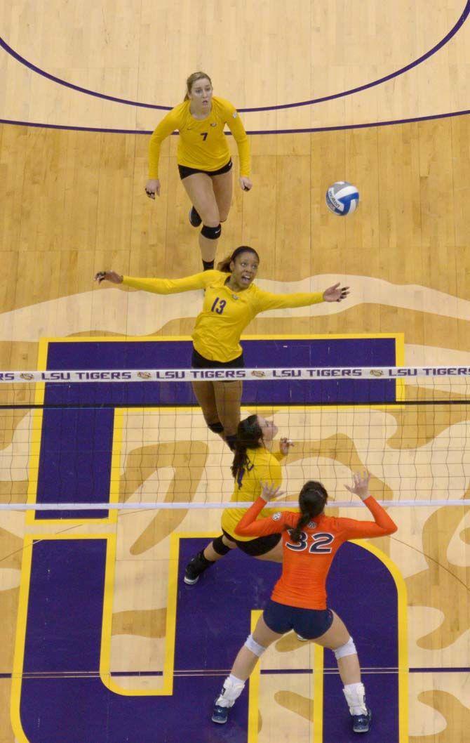 LSU sophomore middle blocker Brianna Holman (13) prepares to hit the ball during the Tigers' 3-0 victory over Auburn Sunday, Nov. 23, 2014 on the PMAC.