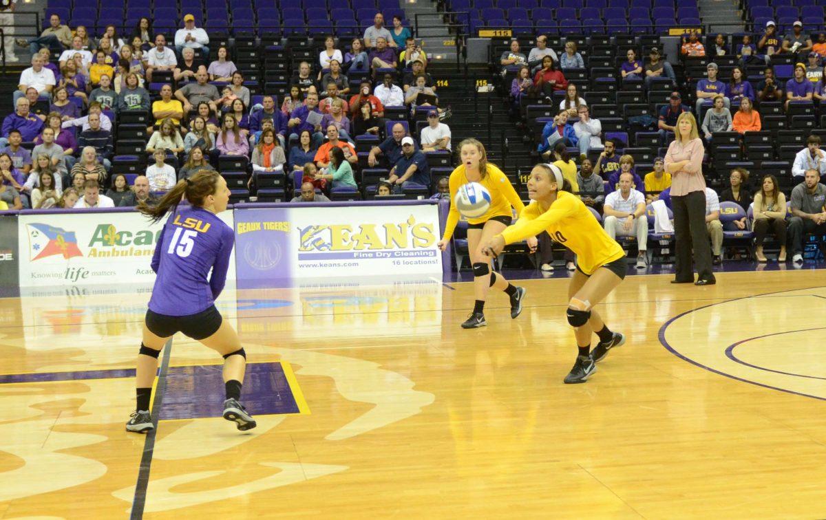 LSU freshman Mini Eugene (#10) sets the ball at the 3-0 Win LSU vs Auburn at the PMAC November 23, 2014.