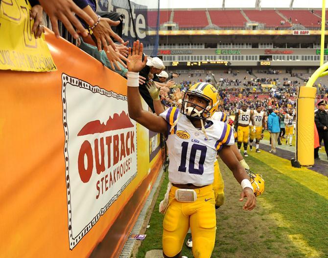 LSU freshman quarterback Anthony Jennings (10)celebrates with fans Wednesday, Jan. 1, 2014 after the Tigers' 21-14 victory against the Iowa Hawkeyes in the Outback Bowl at Raymond James Stadium in Tampa, Florida.