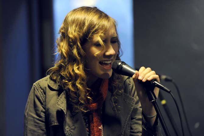 Caroline Schaff performs at the Highlander Music Festival on Friday, Nov. 14, 2014 in Highland Coffees.