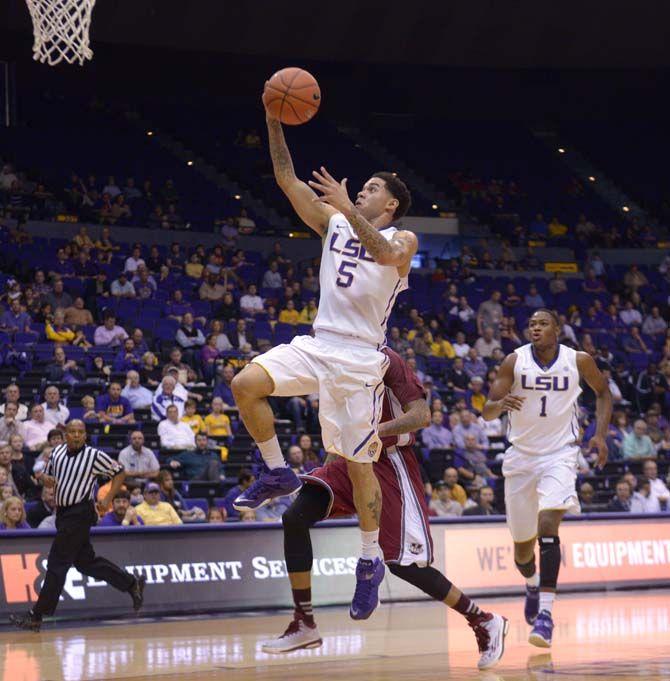 LSU junior Josh Gray (5) makes a lay up during the Tigers' 82- 60 victory against Massachusetts Tuesday, Dec. 2, 2014 on the PEMAC.