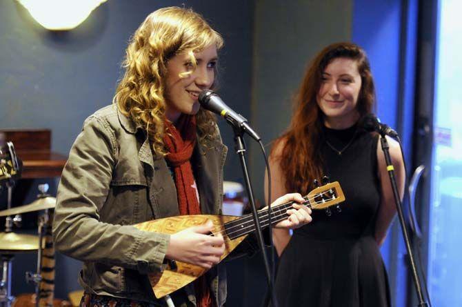 Caroline Schaff and Laura Swirsky perform at the Highlander Music Festival on Friday, Nov. 14, 2014 in Highland Coffees.