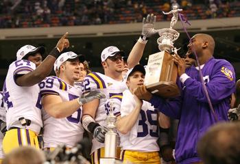 Junior quarterback JaMarcus Russell and the Tigers hold up the Sugar Bowl trophy during the awards presentation after LSU's 41-14 win over the University of Notre Dame in the Superdome.