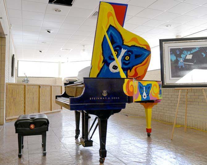 A vintage Steinway Piano was hand painted by George Rodrigue and donated to LSU School of Music by George Rodrigue Foundation for the Arts Monday, Dec. 1, 2014 along with 15 pianos from Hall Piano Company.