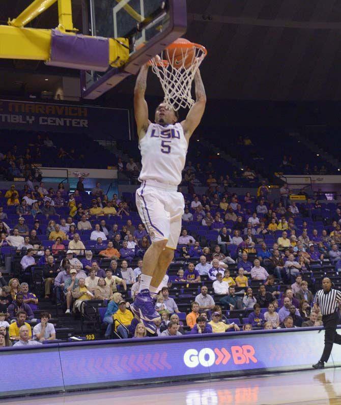 LSU junior Josh Gray (5) dunks the ball during the Tigers' 82- 60 victory against Massachusetts Tuesday, Dec. 2, 2014 on the PEMAC.