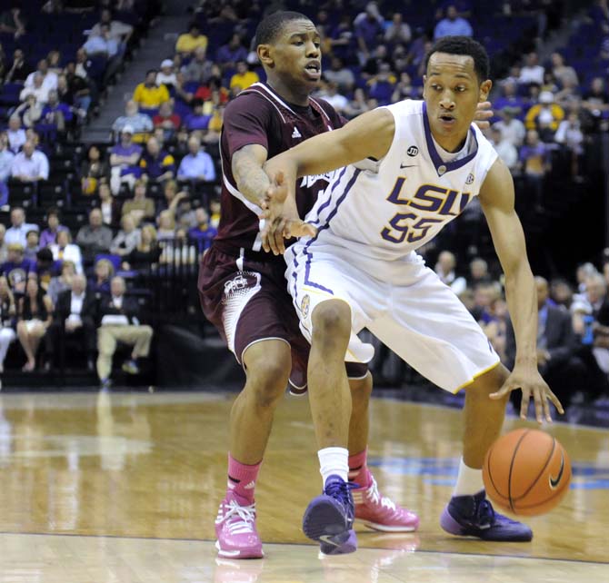 LSU freshman guard Tim Quarterman (55) moves the ball down the court Wednesday Feb. 19, 2014 during the Tigers' 92-81 victory against Mississippi State in the PMAC.