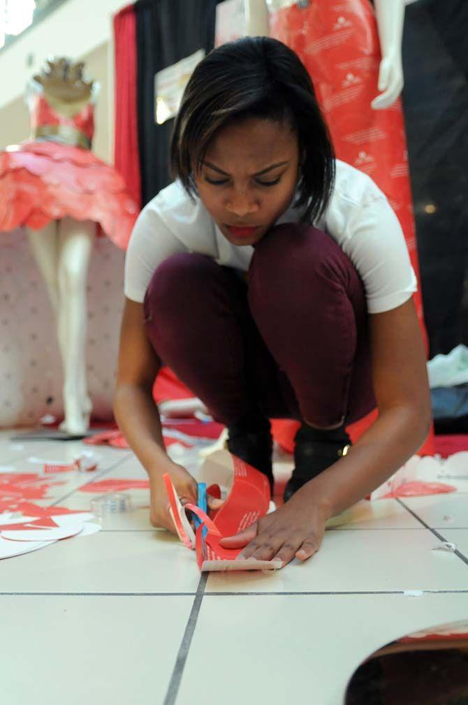 Students design paper heart dresses for heart disease awareness