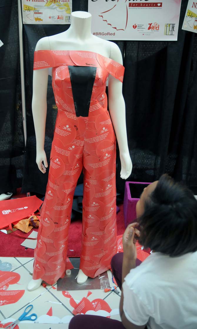 Students design paper heart dresses for heart disease awareness