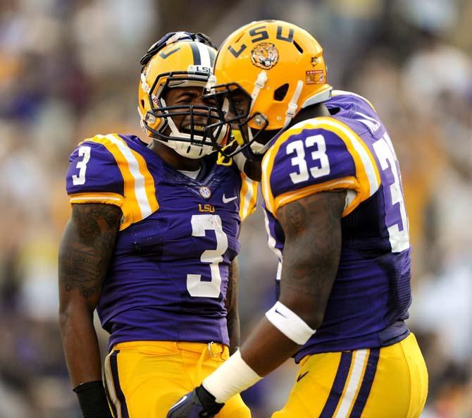 LSU sophomore running back Jeremy Hill (33) and junior wide receiver Odell Beckham Jr. (3) celebrate after a touchdown Saturday, September 14, 2013 in the Tigers' 45-13 victory against Kent State.