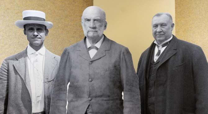 The exhibit features life-size cardboard cutouts of the founding fathers of Cooperative extension (Left to right: Asbury Francis Lever, Seaman A. Knapp, and Michael Hoke Smith)