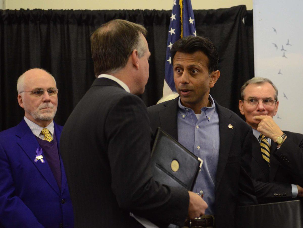 LSU President F. King Alexander (left), Governor Bobby Jindal (right) speak shortly before the breaking ground ceremony on November 17, 2014.