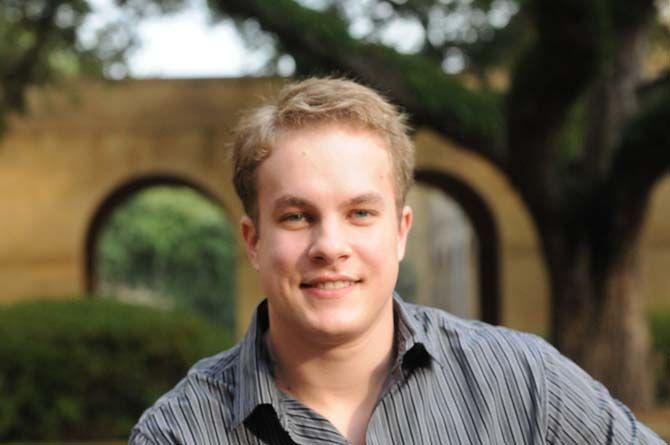 Biological engineering senior, Christopher Sylvester, sitting in the quad on Jan. 12, 2015, is interested in the new Fast Track program starting next semester for biological engineerings students.