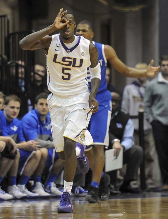 LSU senior forward Shavon Coleman (5) celebrates after making a three-pointer Tuesday, Jan. 28, 2014 during the TIgers' 87-82 win against Kentucky in the PMAC.