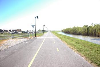 Water from the Mississippi River approaches the levee March 26 on River Road near the LSU School of Veterinary Medicine.