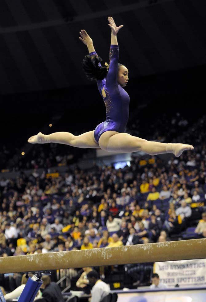 LSU freshman Erin Macadaeg performs her beam routine Friday, Jan. 9, 2015, during the Lady Tiger's 197-193 victory against Iowa in the PMAC