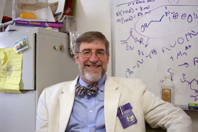 Polymers &amp; Nonlinear Chemical Dynamics professor Dr. John A. Pojman sporting one of his pocket protectors on Jan. 20, 2015 as he sits in his office.