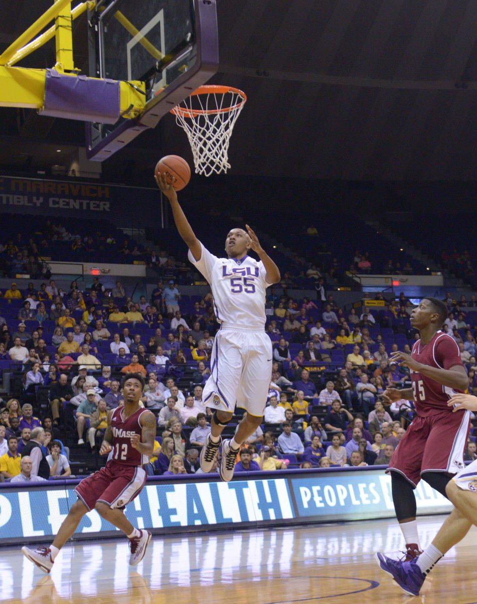 LSU sophomore guard Tim Quarterman (55) makes a lay up during the Tigers' 82- 60 victory against Massachusetts Tuesday, Dec. 2, 2014 on the PEMAC.