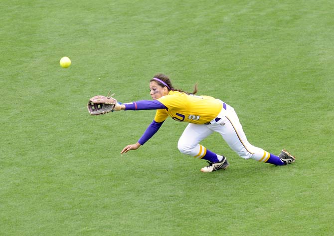 LSU freshman infielder Shavanna Jaquish (2) throws toward first base Sunday, April 6, 2014, during the Tigers' 9-0 loss to Tennessee in Tiger Park.