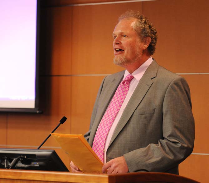 Faculty Senate President Kevin Cope calls the meeting to order April 17, 2013, in the Capital Chamber of the Student Union.