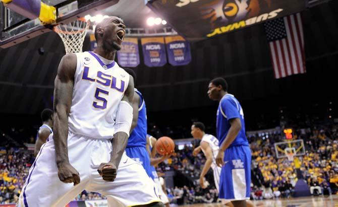 LSU senior forward Shavon Coleman (5) celebrates after scoring Tuesday, Jan. 28, 2014 during the Tigers' 87-82 victory against Kentucky.