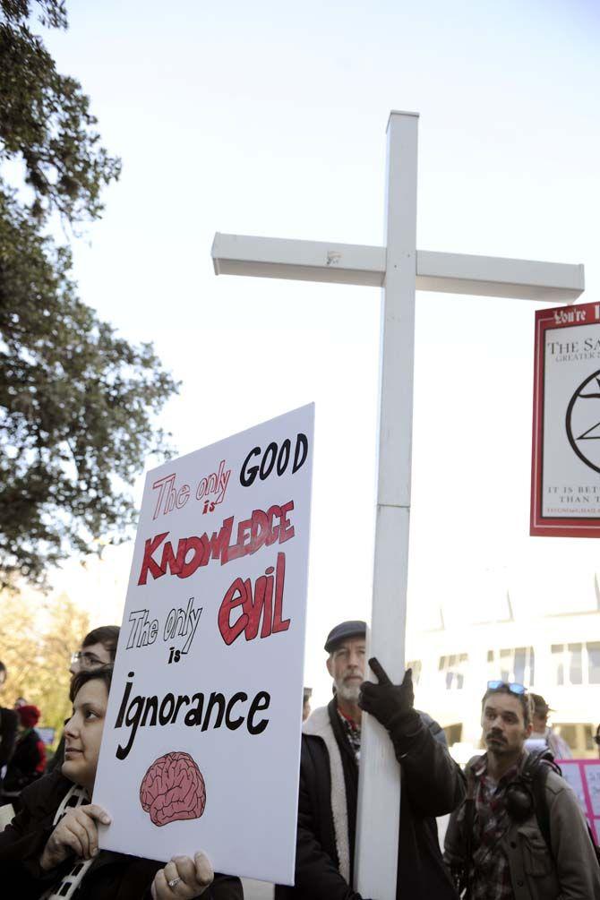 Protesters gather outside the Pete Maravich Assembly Center Saturday, Jan. 24, 2015, after a march against "The Response" event lead by Louisiana Governor Bobby Jindal.