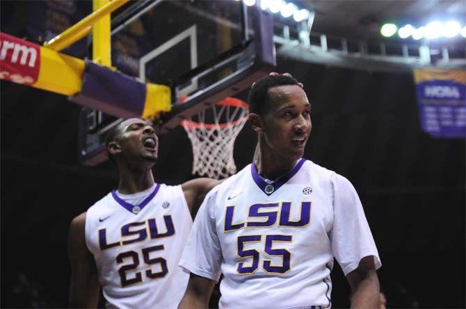 LSU sophomore guard Tim Quarterman (55) and sophomore forward Jordan Mickey (25) celebrate a successful layup by Quarterman on Saturday, Jan. 10, 2015, during the Tigers' 87-84 win against Georgia in the Pete Maravich Assembly Center.