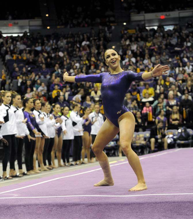 LSU senior Rheagan Courville performs a floor routine Friday, Jan. 9, 2015, during the Lady Tiger's 197-193 victory against Iowa in the PMAC