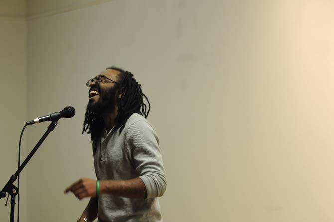 Rodrick Minor on Jan. 20, 2015, reading a poem during the poetry slam competition hosted by The Poetry Alliance.