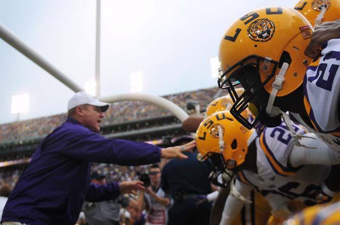 LSU sophomore defensive back Rashard Robinson (21) and his teammates line up in front of LSU head coach Les Miles Saturday, September 6, 2014 during the Tigers' 56-0 win against Sam Houston State in Tiger Stadium.