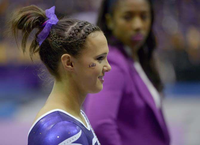 LSU sophomore Ashleigh Gnat watches her teammates take on the vault on Friday, Jan. 23, 2015, during the Lady TIger's 197-192 victory against Missouri in the Pete Maravich Assembly Center.