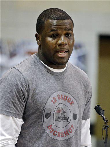 Ohio State quarterback Cardale Jones answers questions at a news conference in Cleveland after announcing he would not enter the NFL draft Thursday, Jan. 15, 2015. Jones, 3-0 as a college starter including a win in the national championship game, says he will return to the Buckeyes for his final two years of eligibility. (AP Photo/Mark Duncan)