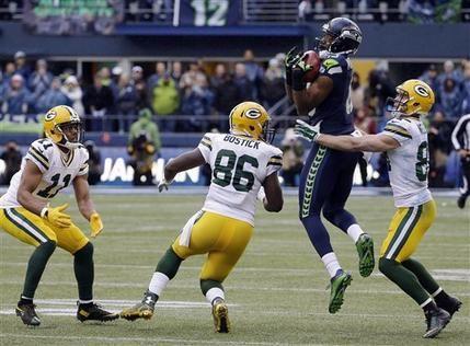 Seattle Seahawks' Chris Matthews recovers an on side kick during the second half of the NFL football NFC Championship game against the Green Bay Packers Sunday, Jan. 18, 2015, in Seattle. (AP Photo/David J. Phillip)