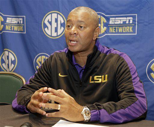 Louisiana State head coach Johnny Jones answers a question during a news conference at the Southeastern Conference NCAA men's college basketball media day in Charlotte, N.C., Wednesday, Oct. 22, 2014. (AP Photo/Chuck Burton)